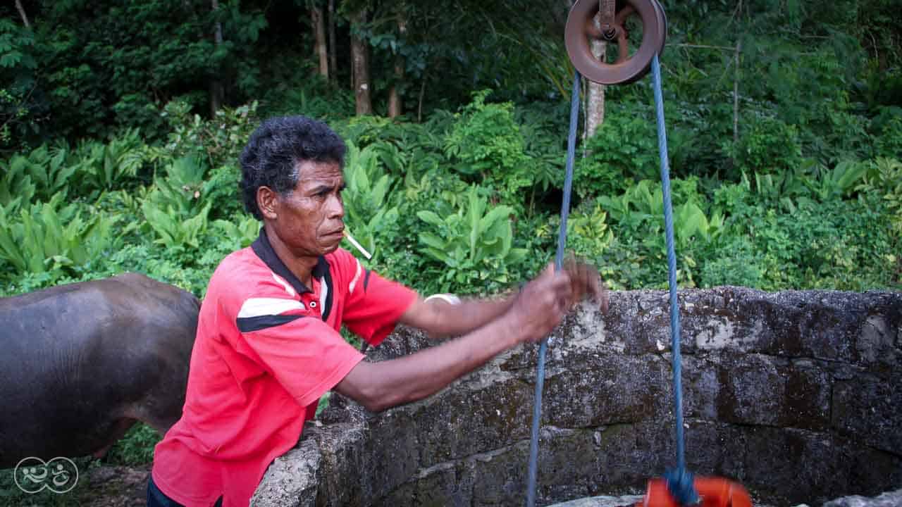 A prayer for water around a well in East Sumba