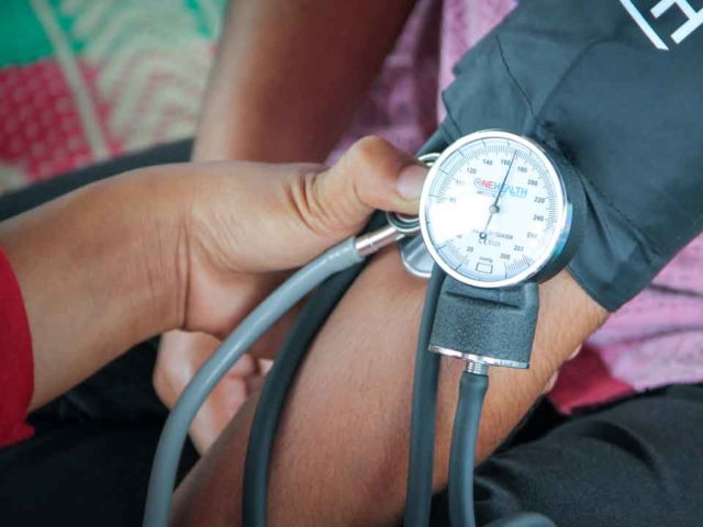 Training in taking blood pressure as part of the primary medical care program in rural areas.