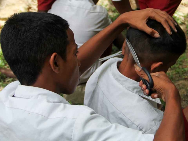 Resilience and Laughter: Haircuts and Hygiene in Ultra-Rural Laindatang.