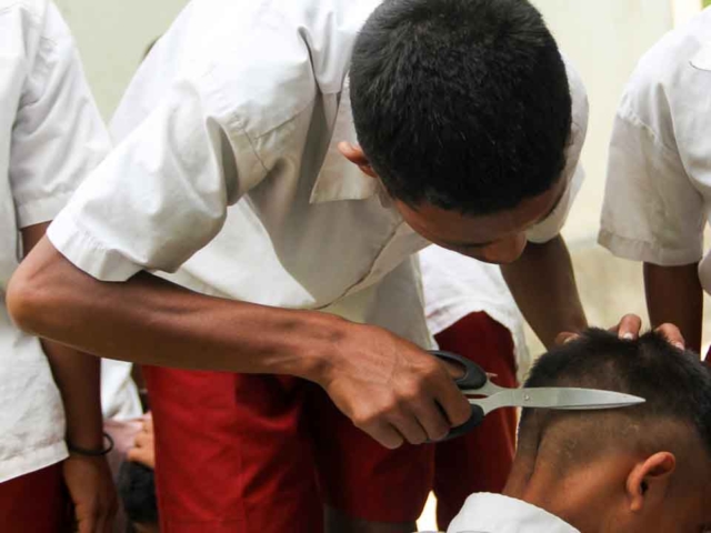 Resilience and Laughter: Haircuts and Hygiene in Ultra-Rural Laindatang.