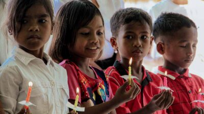 Fair Future team celebrating Christmas with children and families in East Sumba.