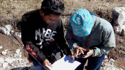 Photos of Fair Future Foundation staff and local community members working together on construction and educational projects, symbolizing collaboration and shared learning.