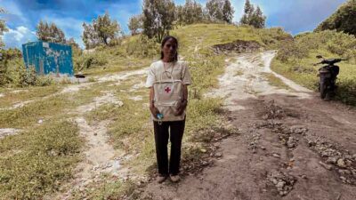 A Kawan Sehat health agent with her fully equipped medical backpack in East Sumba