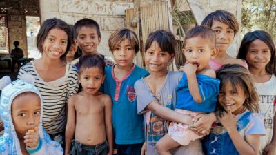 Fair Future team unloading medical supplies and water tanks for isolated villages in Sumba.