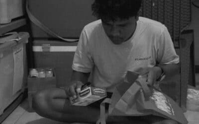 Erwin prepares supplies for Kawan Sehat’s health workers.