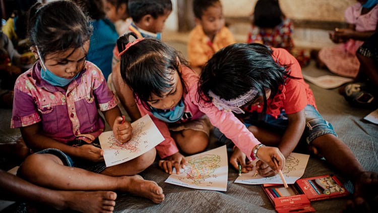 Children draw during an educational activity at the school built by Fair Future in Mbinudita, East Sumba, where learning is the foundation for better health and a safer future.