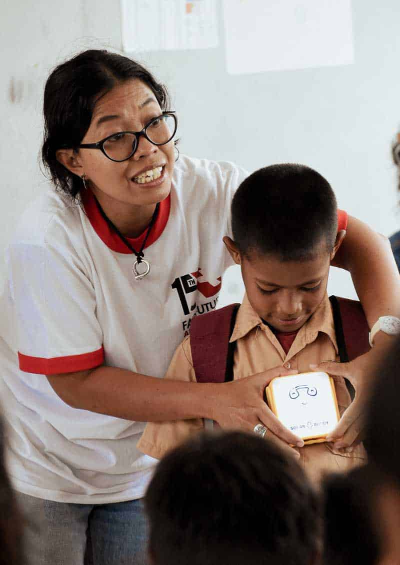 Swiss Non-Profit Organisation working in most rural areas of South EWast Asia | The Fair Future Foundation Women from rural villages reading the Kawan Sehat book and learning about healthy living.