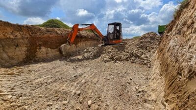 Construction of the 115 m³ Rainwater Reservoir in Laindatang » The Fair Future Foundation Construction of Fair Future’s 115 m³ rainwater reservoir in Laindatang, showing stages from foundation digging to roof installation and filtration system setup, built in remote conditions without electricity or water.