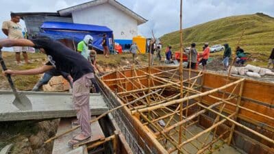 Construction of the 115 m³ Rainwater Reservoir in Laindatang » The Fair Future Foundation Construction of Fair Future’s 115 m³ rainwater reservoir in Laindatang, showing stages from foundation digging to roof installation and filtration system setup, built in remote conditions without electricity or water.