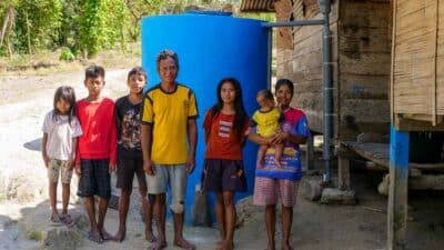 Workers build ferro cement reservoir in Hambarita village.