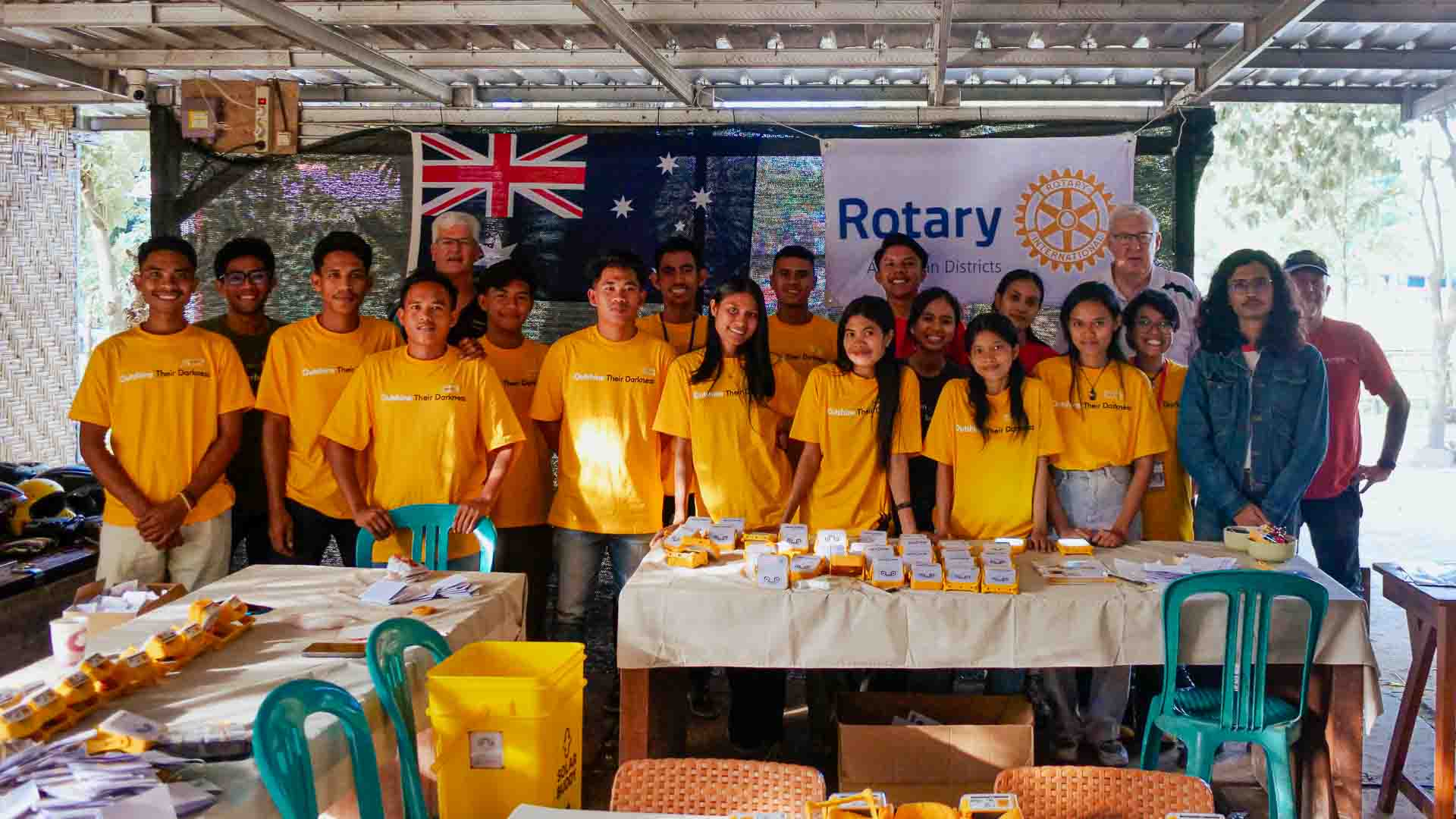 Volunteers and Rotary testing SolarBuddy lamps at Rumah Kambera in East Sumba