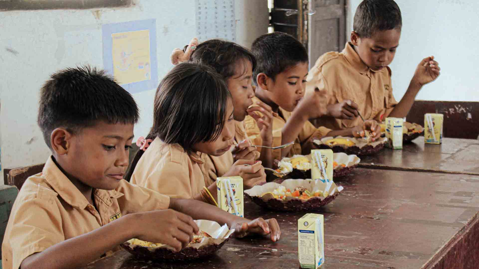 Rural child in East Sumba growing vegetables in a nutrition program