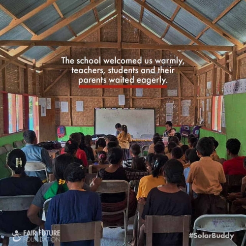 SolarBuddy lamps Lapinu children portrait Girl in Lapinu holding a SolarBuddy lamp that replaces smoke and gives clean study light in a remote East Sumba village.