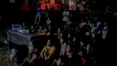 Children watch first film powered by Mbajik solar electrification