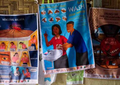 HIV prevention poster explaining transmission and protection for rural families in East Sumba