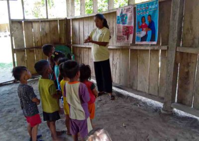 HIV prevention poster explaining transmission and protection for rural families in East Sumba