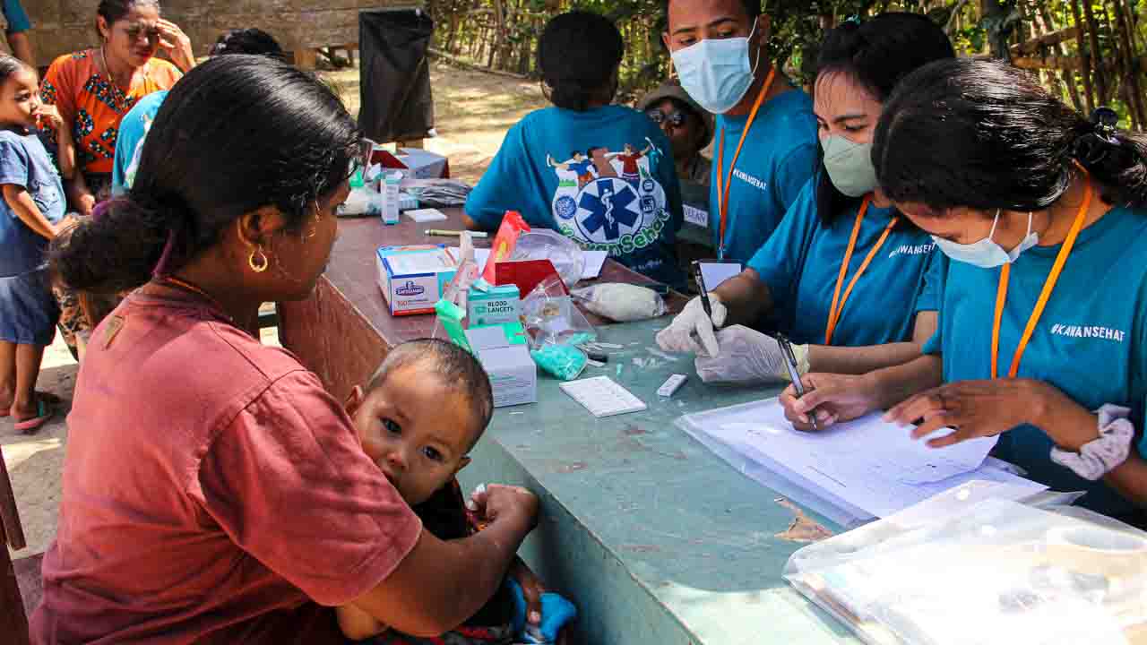 Field-based humanitarian action and working principles Field-based humanitarian action illustrating working principles through medical care, water access, education, and community engagement