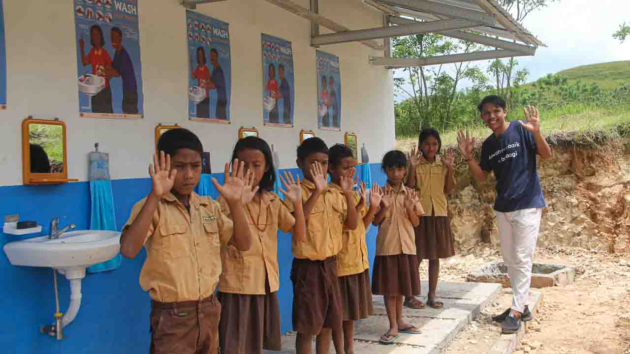 Field-based humanitarian action and working principles Field-based humanitarian action illustrating working principles through medical care, water access, education, and community engagement