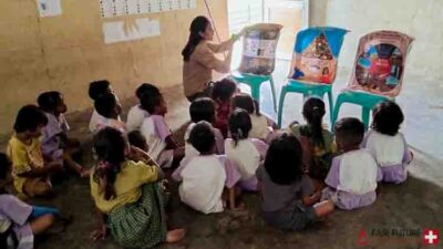 Kawan Sehat health agents from Fair Future Foundation providing primary medical care, wound treatment, blood pressure checks, and health support to children, adults, and elderly people in remote villages of East Sumba, Indonesia