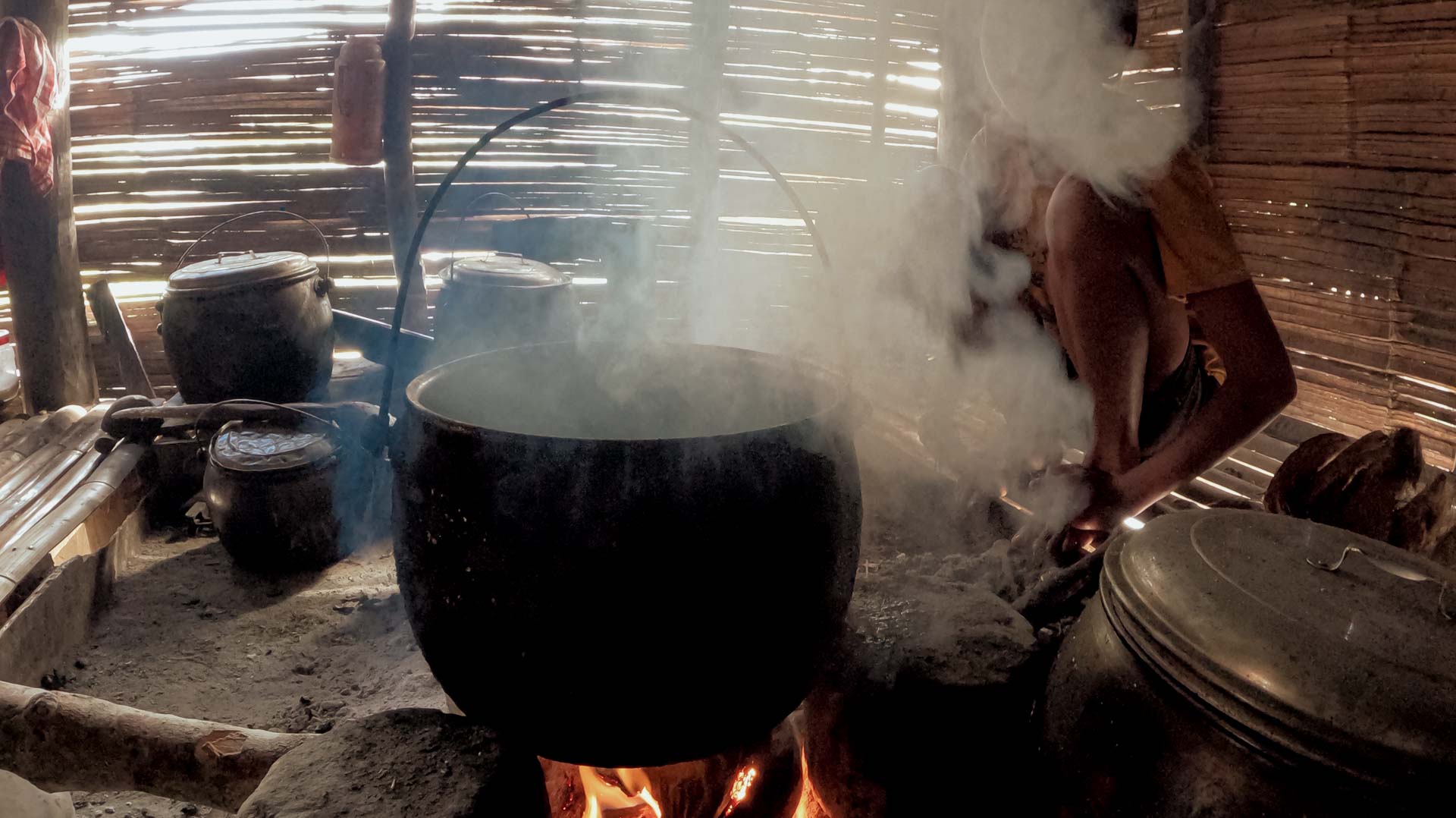 Cooking Should Not Cost Your Health | Wood Smoke in East Sumba A woman cooking with wood in a smoke-filled rural home in East Sumba, Indonesia.