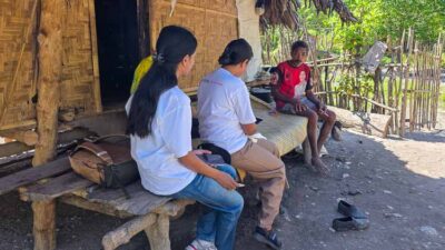 Field workers conduct a household interview during the Sumba Sepsis Study.