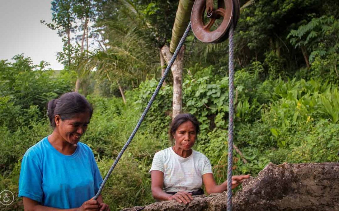 A prayer for water around a well in East Sumba