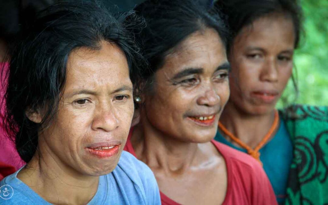 Strong women carry sand for the construction of a new clean water tank