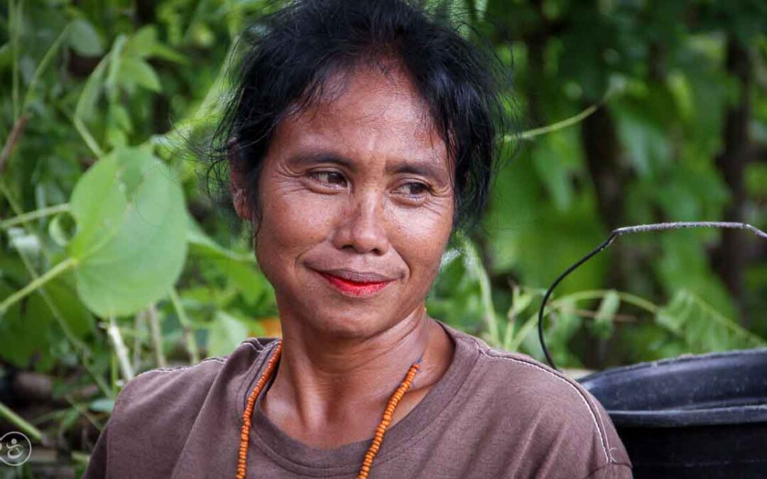 Strong women carry sand for the construction of a new clean water tank