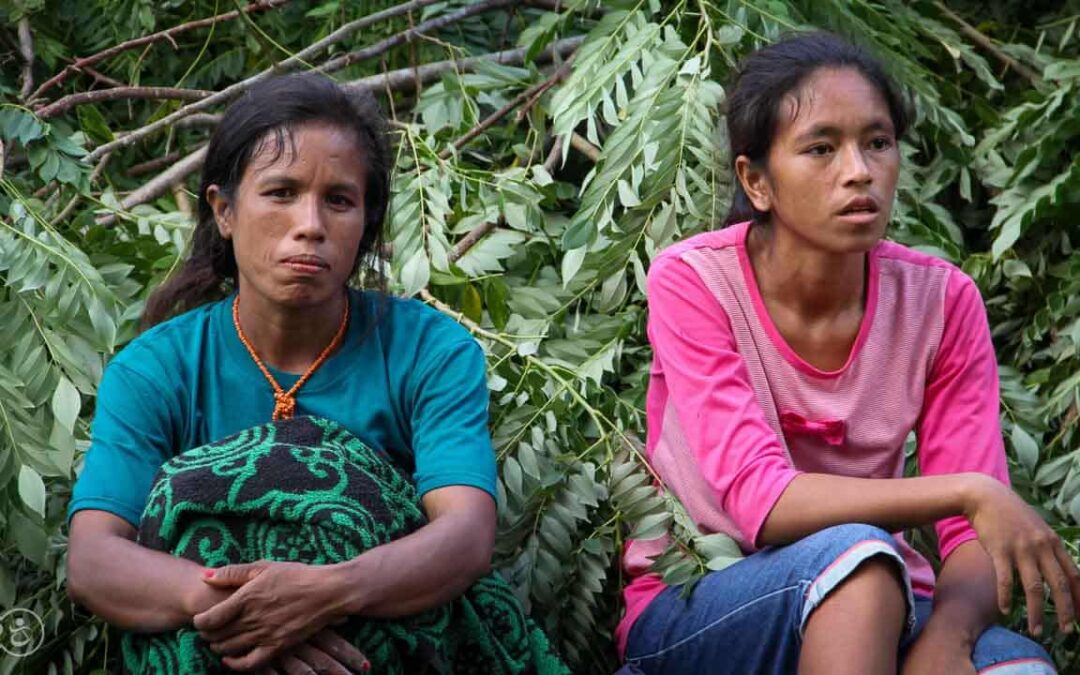 Strong women carry sand for the construction of a new clean water tank