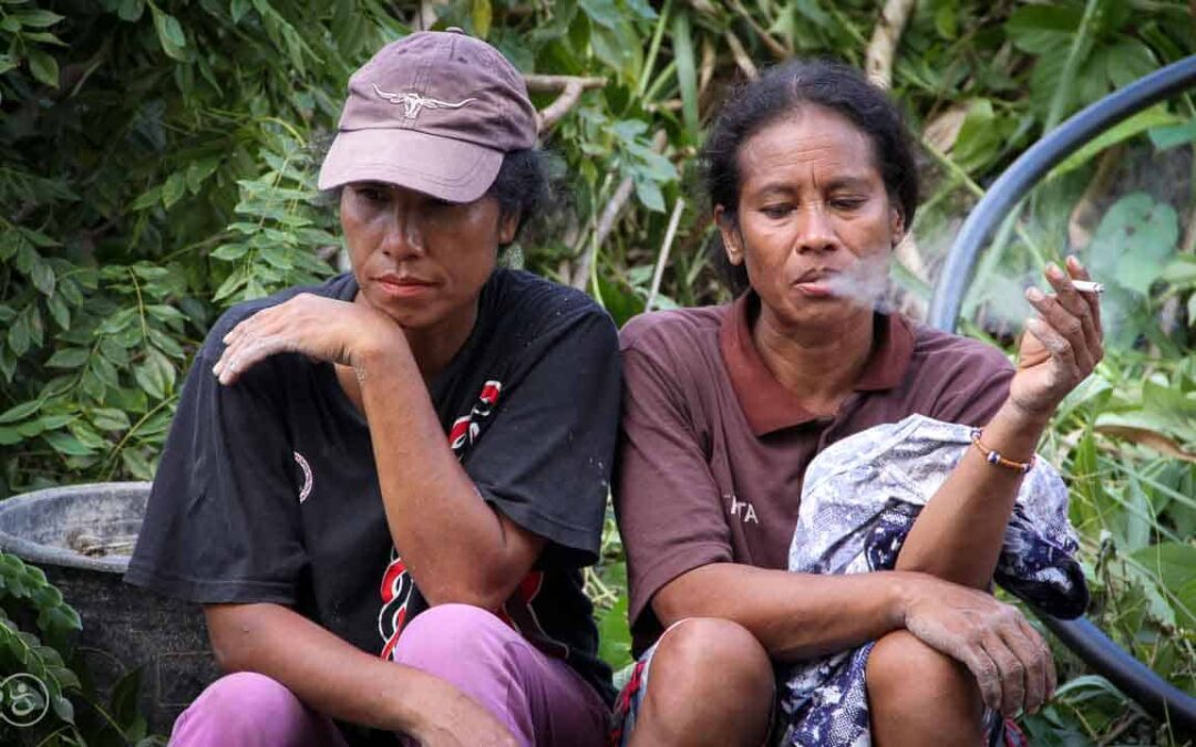 Strong women carry sand for the construction of a new clean water tank