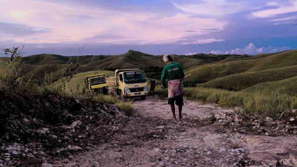 Rural health infrastructure in East Sumba showing road access, medical transport and vaccine delivery