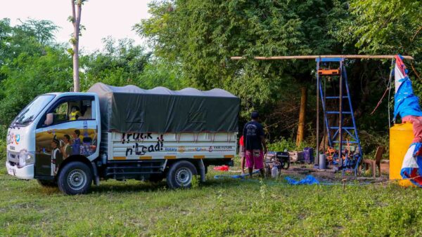 Deep drilling work for Rumah Kambera 2.0 beside the Fair Future field truck in East Sumba.
