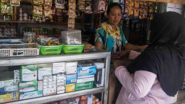 Local warung in rural Indonesia selling common medicines including paracetamol, amoxicillin and dexamethasone